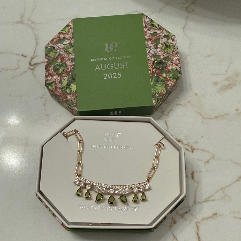 BP Gold Necklace with Green Accents